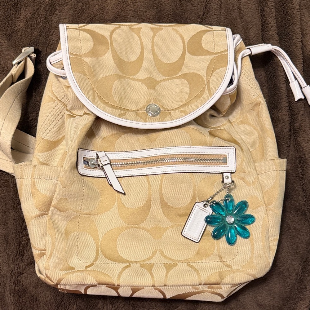 Coach Tan Backpack with Teal Floral Charm